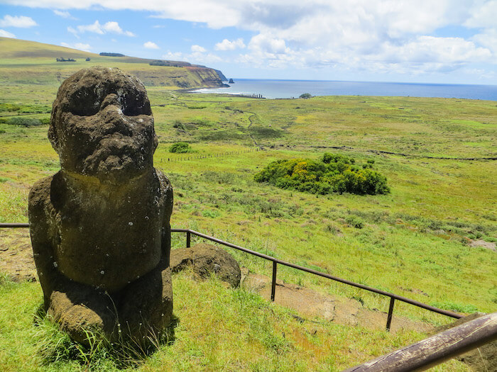 Things to Do on Easter Island (Rapa Nui) in Three Mysterious Days • Travel on the Reg A moia looks on at Rano Raraku Quarry on Easter Island.