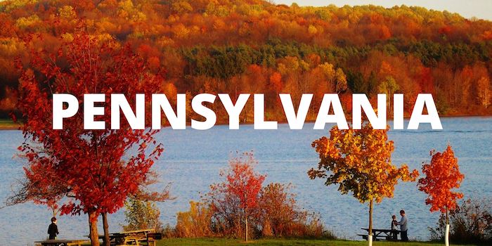 Pennsylvania in large text with red leaves in autumn in the background