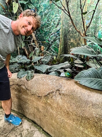 A man poses with a little bird at the Tracy Aviary in Salt Lake City.