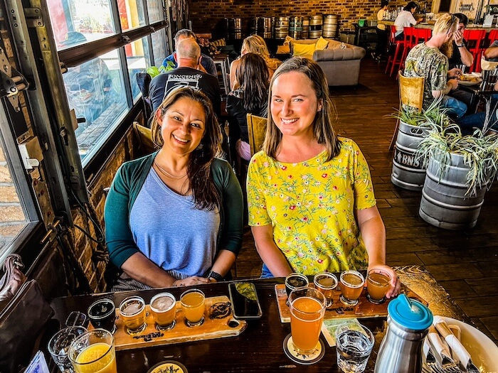 Two ladies sip on beer at Bay City in San Diego.