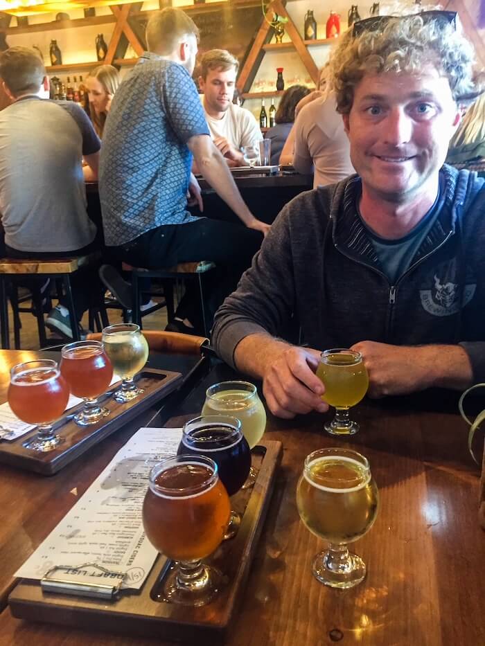 A sandwich and beer at Gravity Heights, a brewery in San Diego