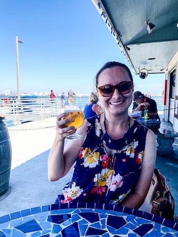 A woman sits and sips a beer at Fathom in San Diego. It's a beer bar, but should still top lists for best brewery in San Diego.