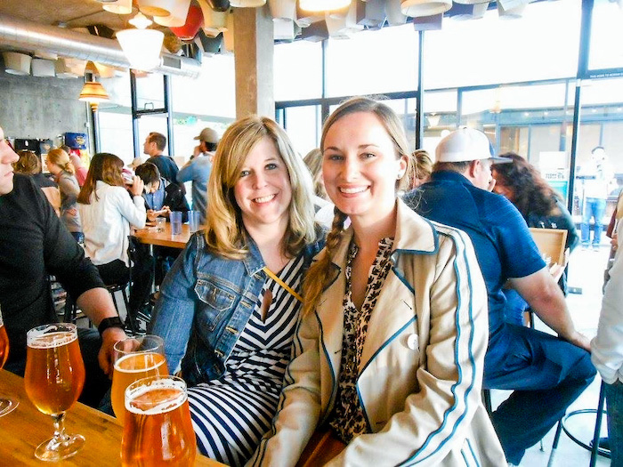 Two friends have beers at Modern Times in San Diego.