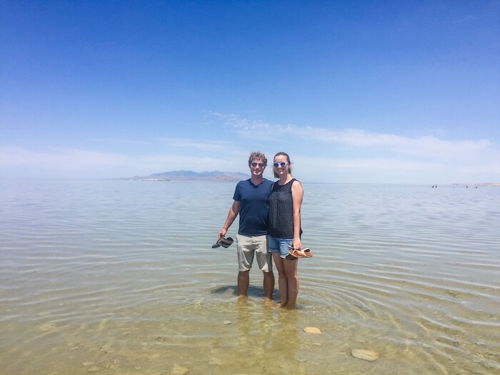 A couple stands in the Great Salt Lake.