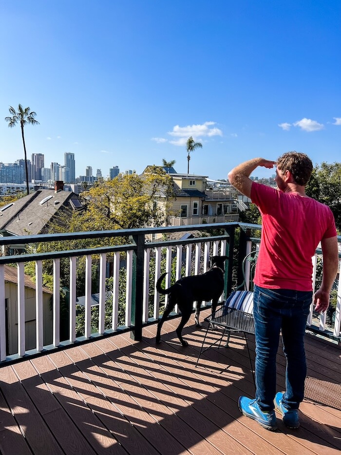 A man looks out onto Golden Hill, San Diego.