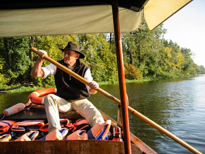 A man handling a gondola ride in Poland