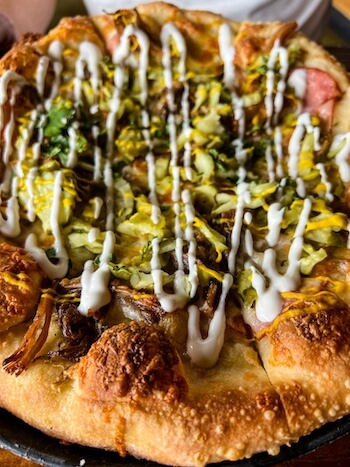 A decadent pizza at Slackwater in Salt Lake City