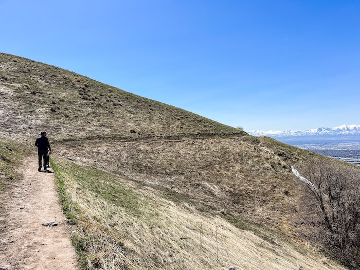 A man walks down the Bonneville Shoreline Trail in Salt Lake City.