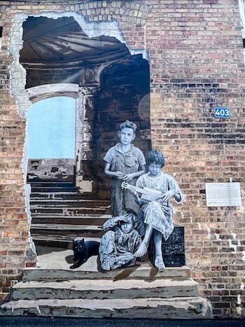 A mural depicting pioneer children in Salt Lake City