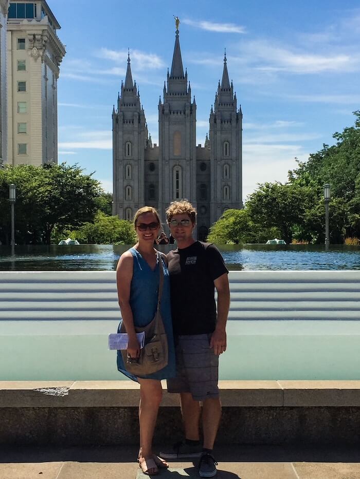 A couple poses on Temple Square in Salt Lake City.