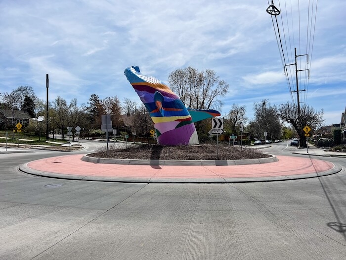 A large blue whale coming out of a roundabout in Salt Lake City