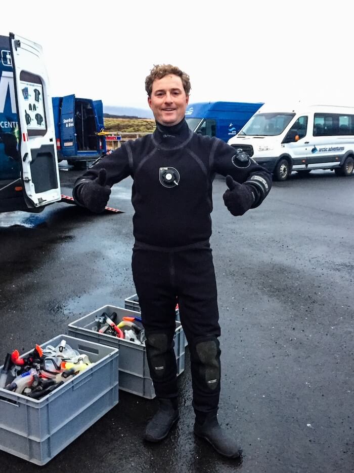 A man gets ready to snorkel the Silfra in Iceland.