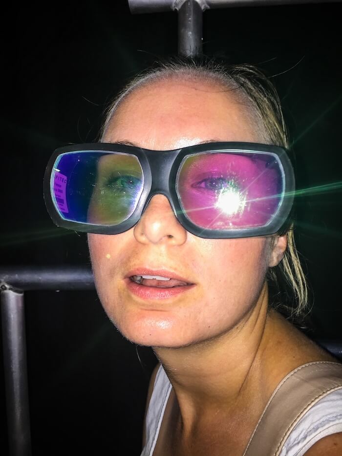 A woman in a Warsaw museum with 3D glasses on