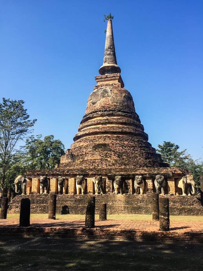 Wat Chang Lom and its elephants decorating the exterior in Sukhothai