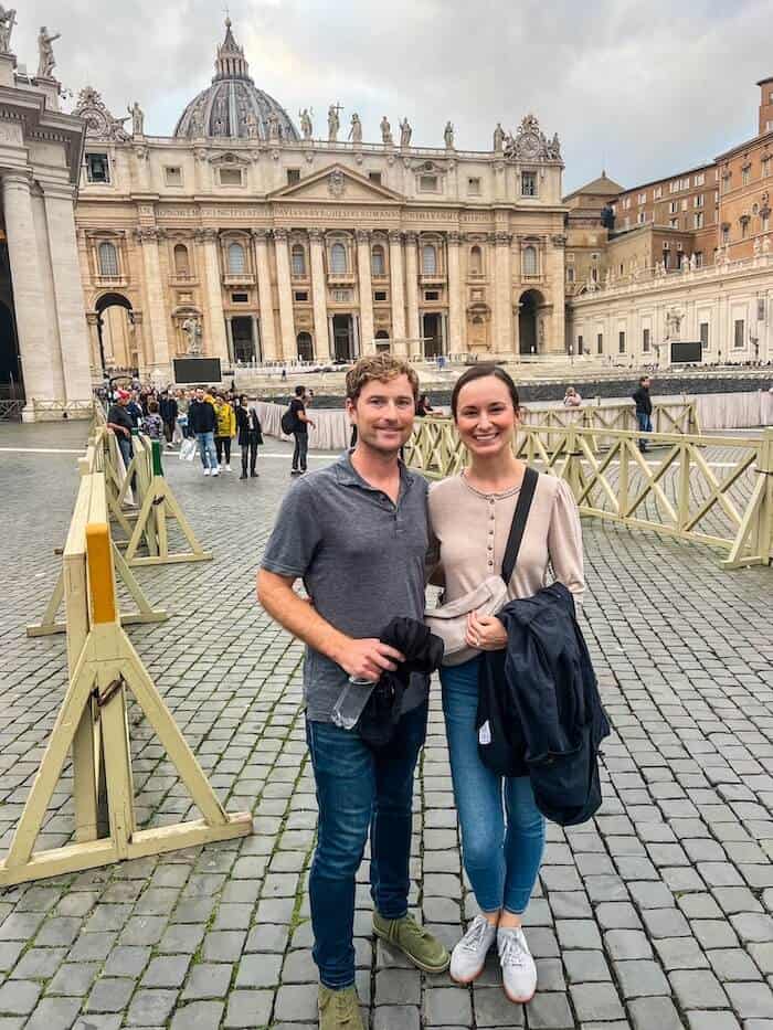 A couple poses in Vatican City.