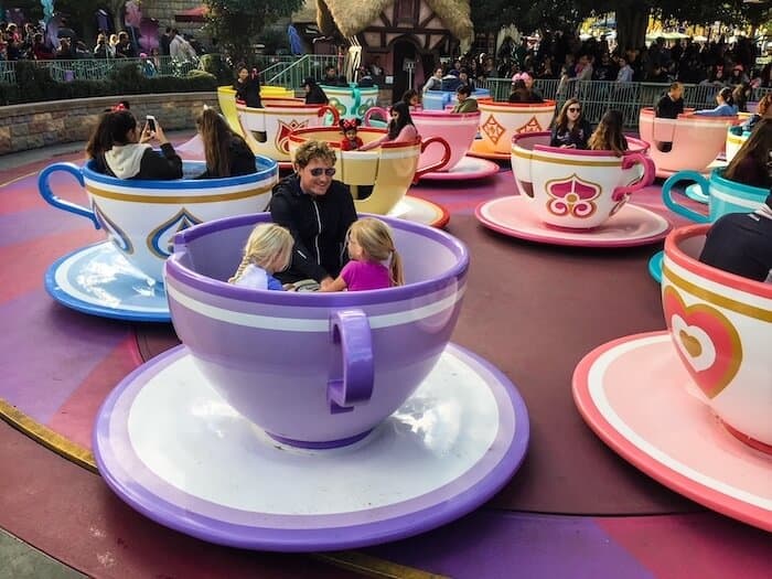 A man rides a ride at Disney.