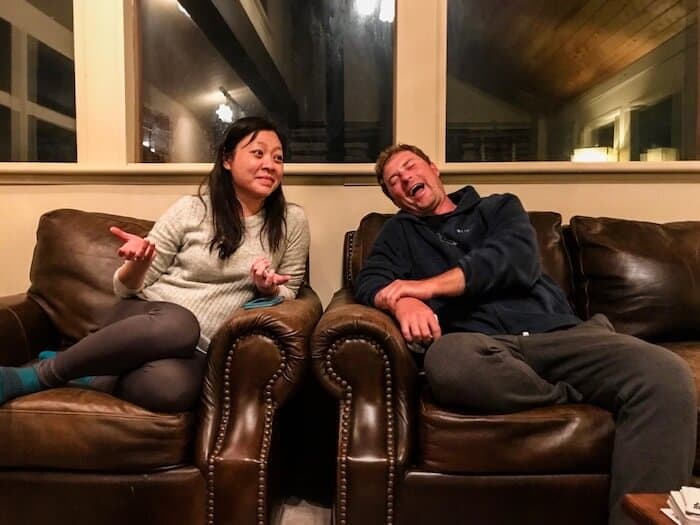 A man goofs around with his close friend.
