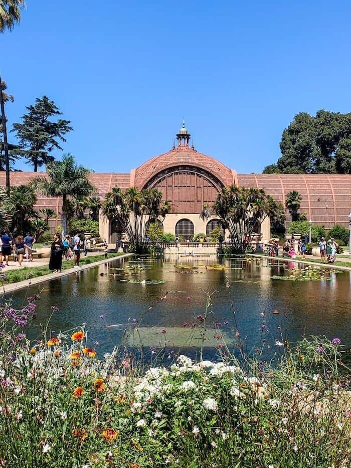 The outside of the  Botanical Building and Lily Pond in San Diego's Balboa Park.