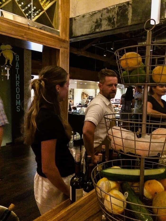 A woman waits to meet celebrity chef Richard Blais at his restaurant in San Diego, California.