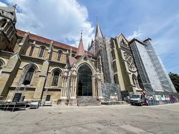 A cathedral covered in scaffolding in Lausanne, Switzerland