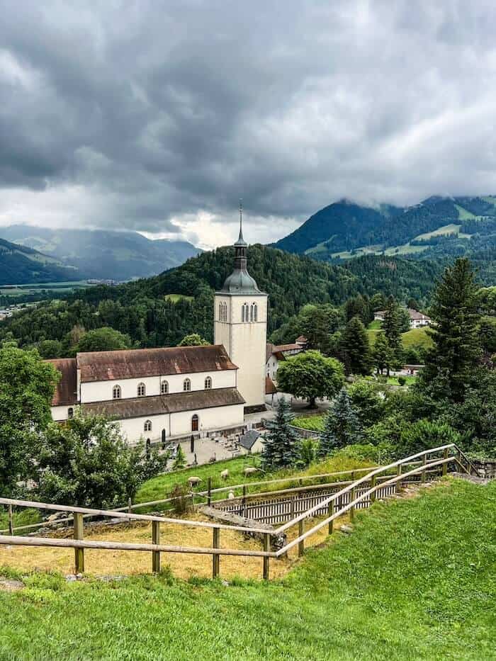 The Castle of Gruyères against a dark sky