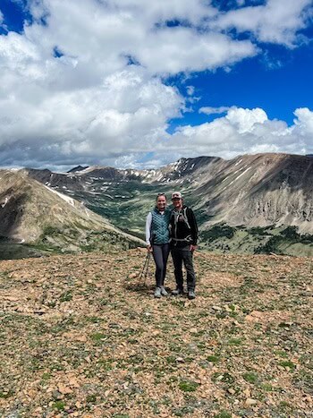 A couple poses at the top of Pennsylvania Mountain.