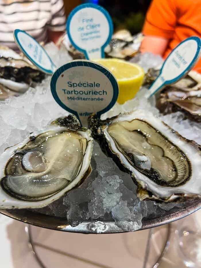 A closeup of oysters on a platter
