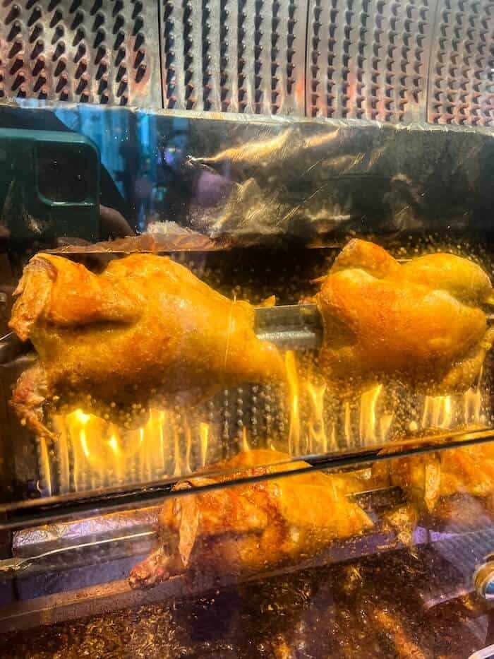 Rotisserie chickens on the fire in France