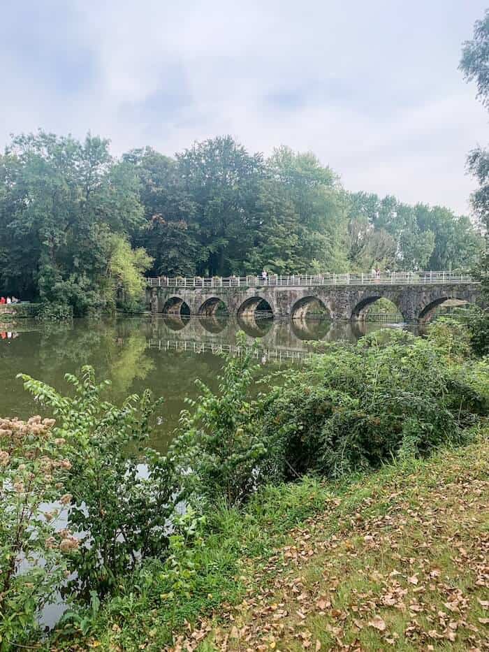 A bridge near a scenic lake in Bruges