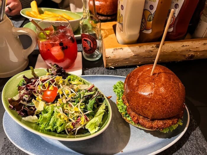 A burger and a salad at a restaurant in Germany