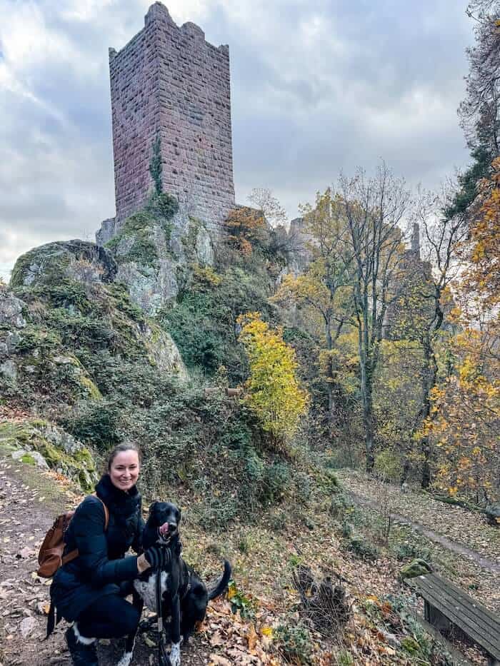 A woman and her dog on a hike in France