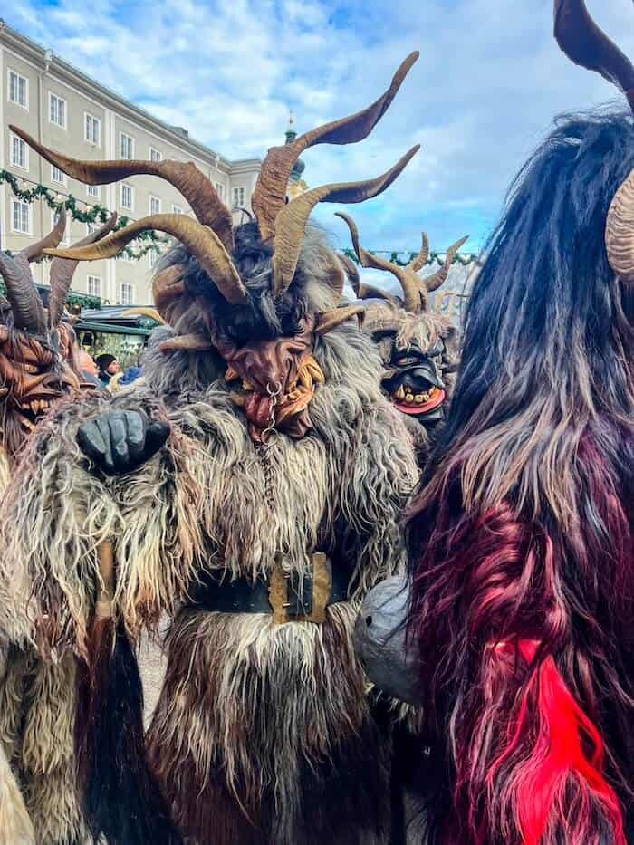 A Christmas monster walks in a parade in Salzburg.