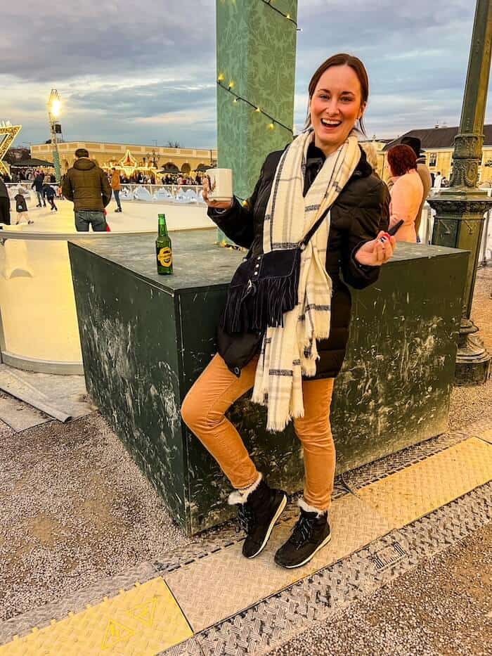 A woman poses in her winter attire.