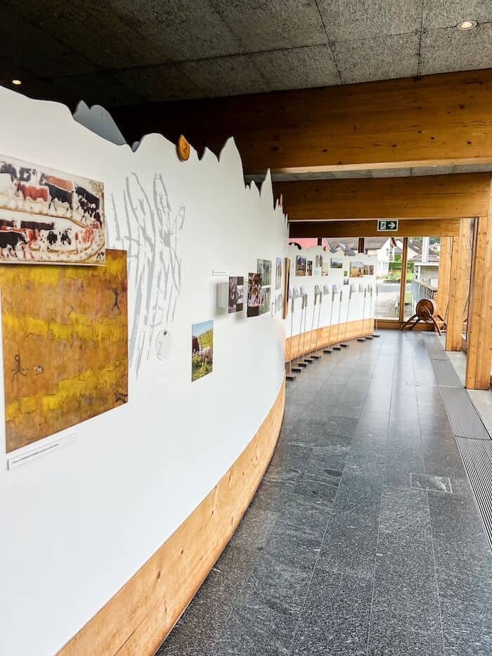 A hallway through the exhibits at La Maison du Gruyère