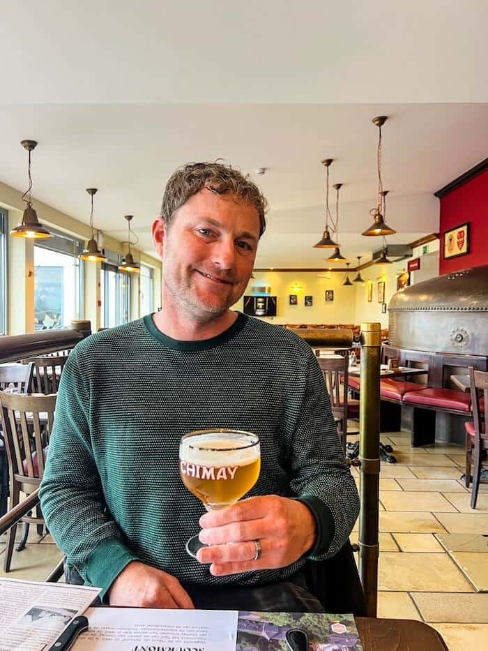 A man sips on a Westvleteren beer.