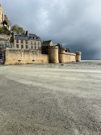 Imposing medieval walls outside of Mont-Saint-Michel