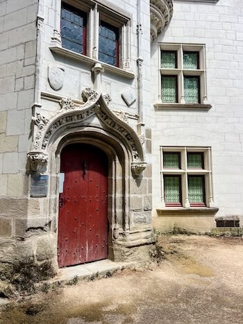 A red door near a church in Nantes