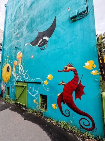 A seahorse and other sea creatures painted on a wall in Nantes
