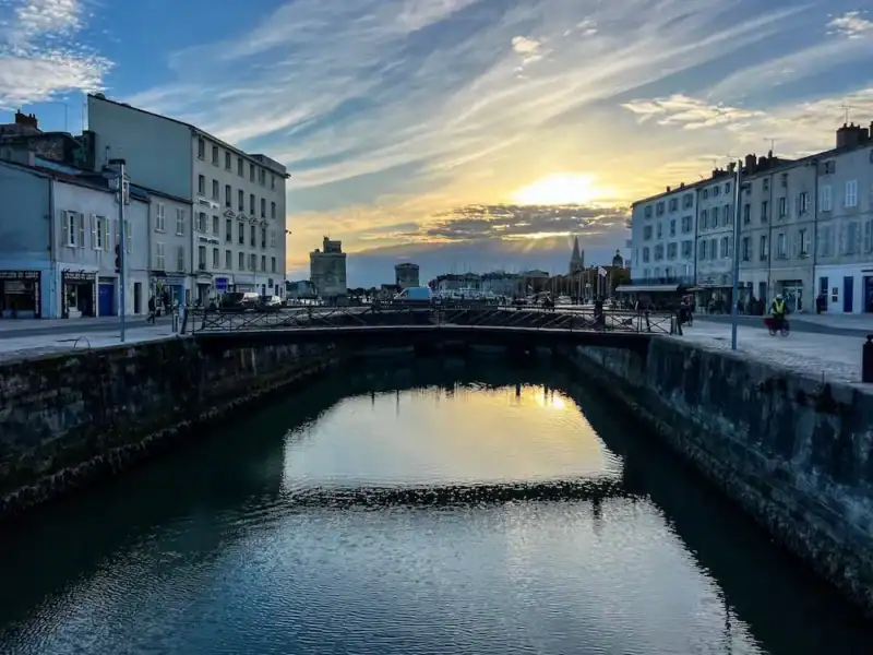 The sun sets over La Rochelle.