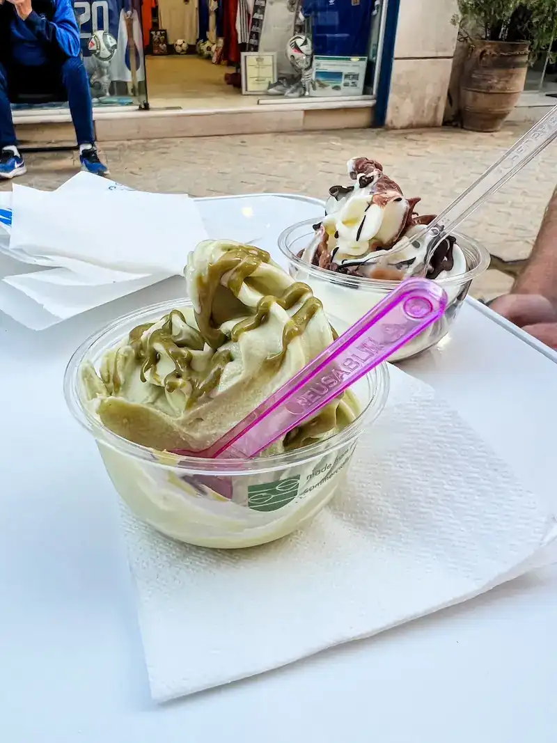 Pistachio ice cream, drizzled in pistachio, in Chania