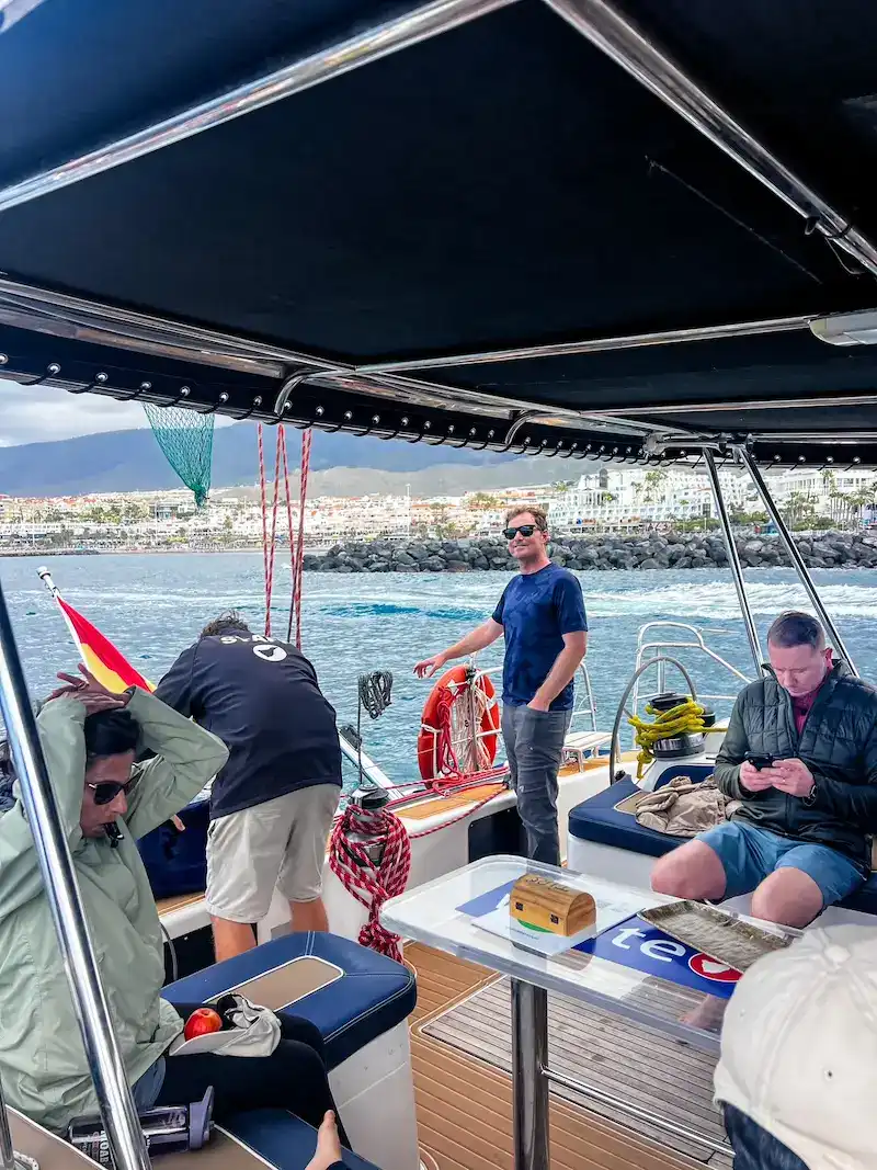 A man poses with others on a whale watching trip in Tenerife.