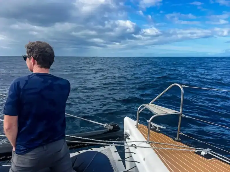 A man looks out at the sea for whales in Tenerife.
