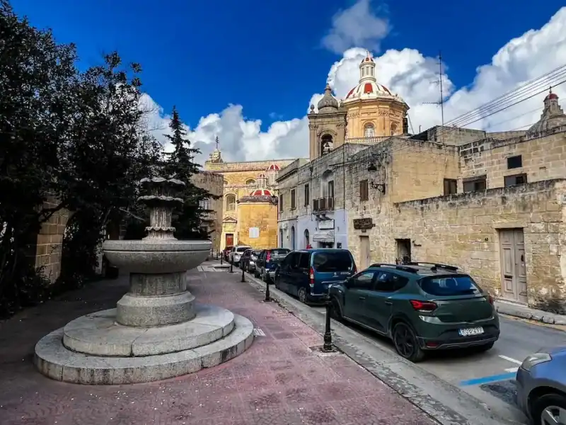 Cars along the side of the road in Malta