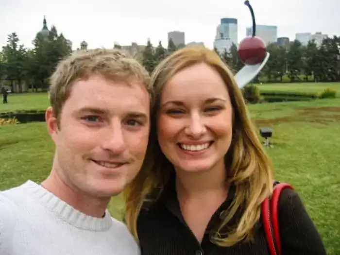 A couple pose at a sculpture in Minnesota.