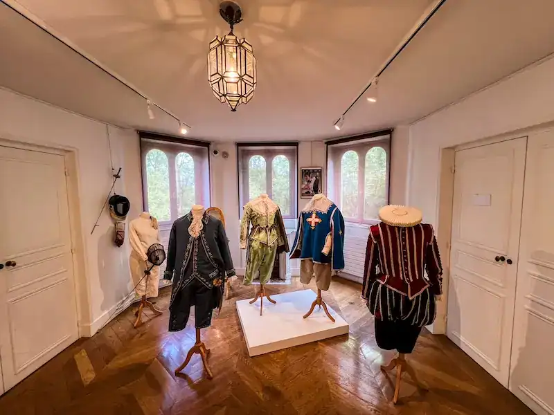 An exhibit featuring costumes at the Château de Monte-Cristo
