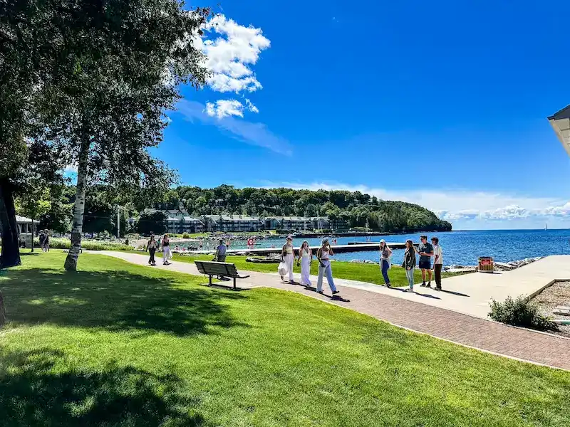 People walking along the bay in Sister Bay, Door County.