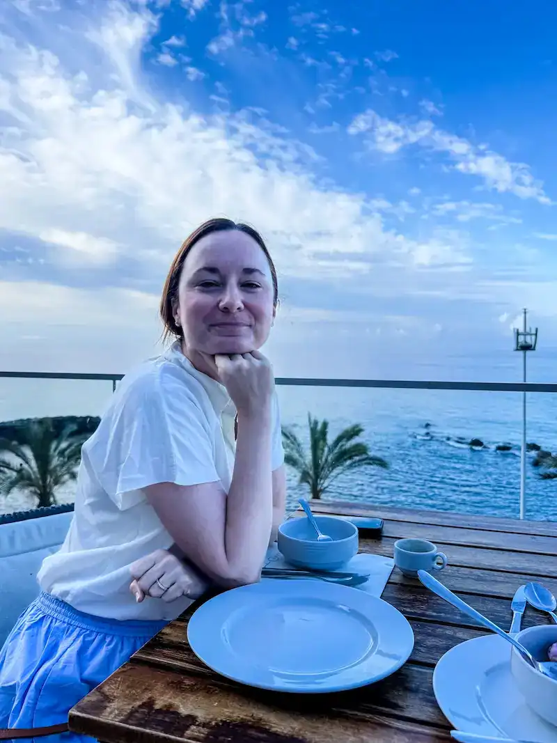 A woman eats her breakfast in Madeira.