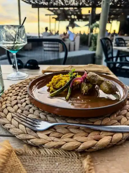 A plate of food and wine in Madeira