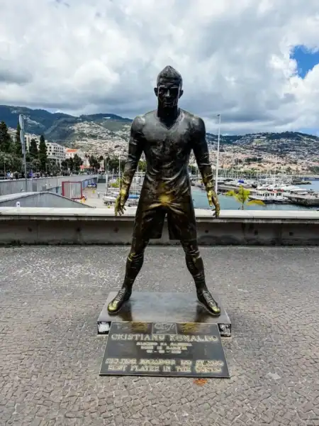 A statue rubbed golden in Funchal, Madeira
