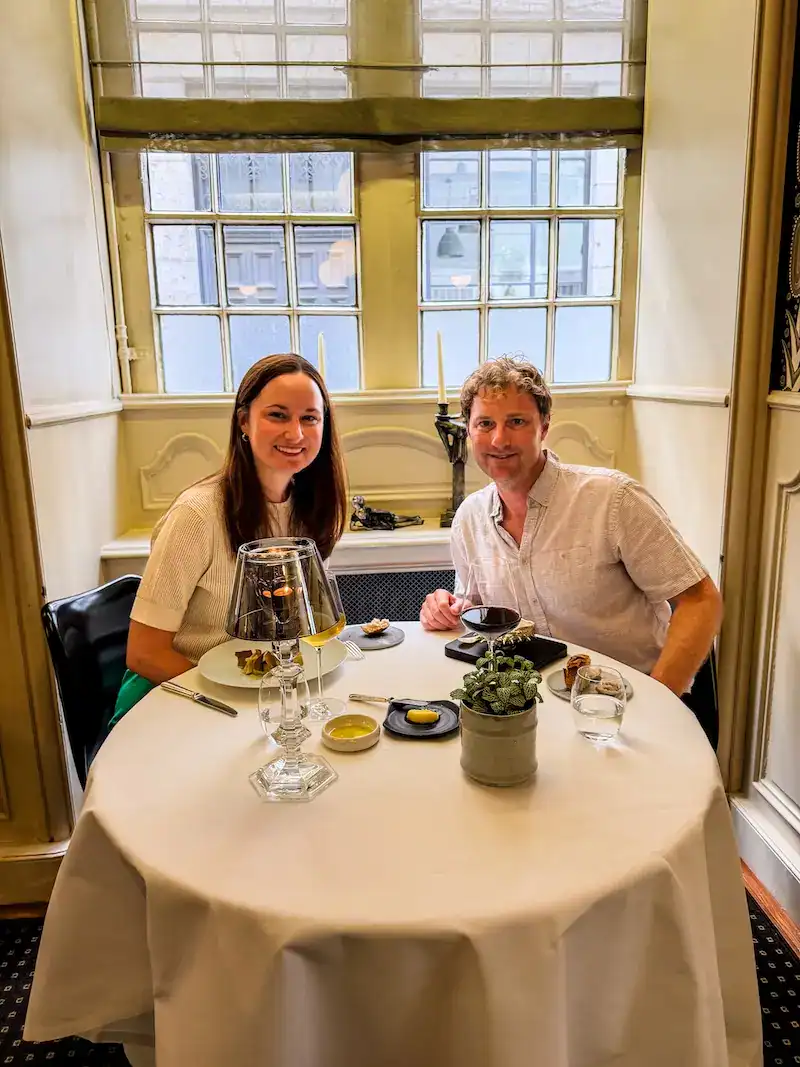 A couple enjoys a meal during one day in Lyon.